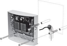 2. Percez les trous aux emplacements indiqués pour les vis et le câblage, puis fixez le récepteur au mur ou à une autre surface. 